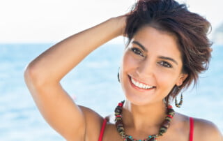 Portrait Of Happy Beautiful Young Woman In A Summer Day